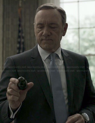 Francis’s black suit and blue and white patterned tie on House of Cards
