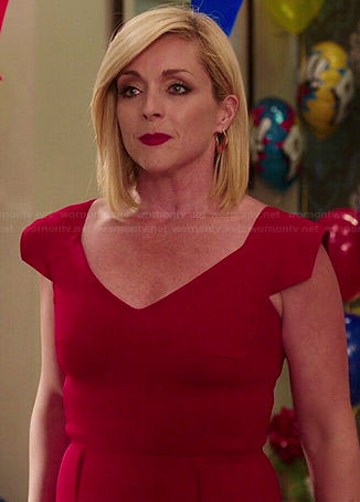 Jacqueline’s red v-neck dress on Unbreakable Kimmy Schmidt