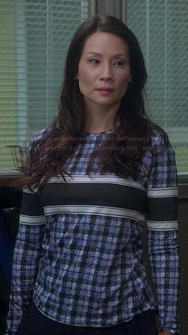Joan’s blue checked and stripe long sleeve top on Elementary