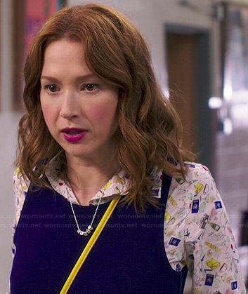 Kimmy’s French printed shirt and navy dress on Unbreakable Kimmy Schmidt