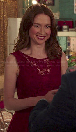 Kimmy’s red v-back lace dress on Unbreakable Kimmy Schmidt