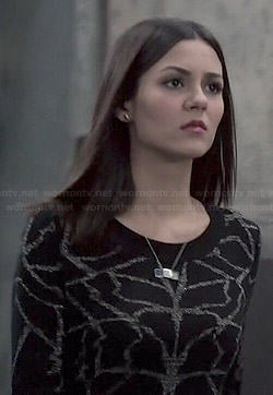 Lindy’s black patterned sweater on Eye Candy