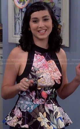 Mandy’s floral peplum top on Last Man Standing