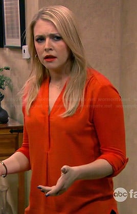 Mel’s orange v-neck blouse on Melissa and Joey