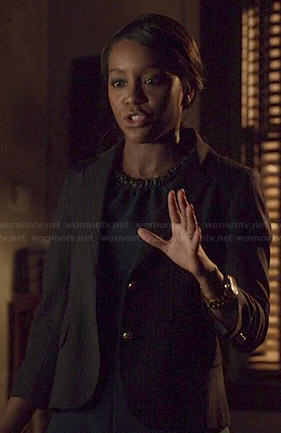 Michaela’s navy blue dress with leather neckline on How to Get Away with Murder