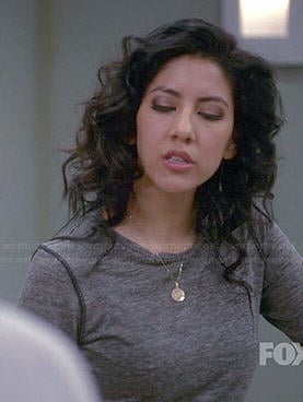 Rosa’s grey long sleeved top with piping on Brooklyn Nine-Nine