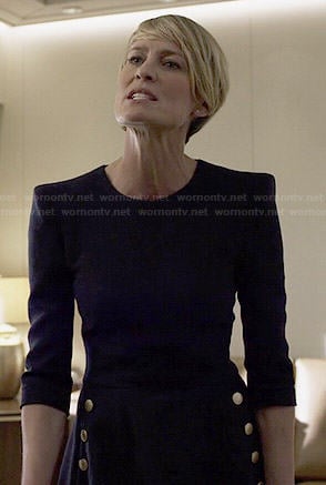 Claire’s navy flared dress with gold buttons on House of Cards