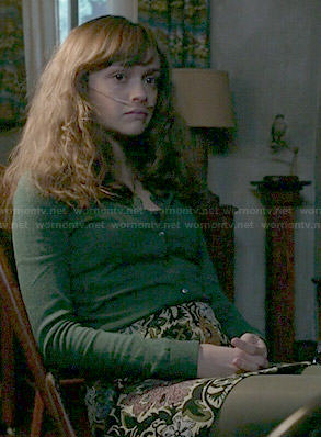 Emma’s floral skirt and green cardigan on Bates Motel