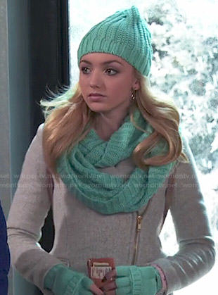 Emma’s grey zipped coat and turquoise gloves, scarf and beanie on Jessie