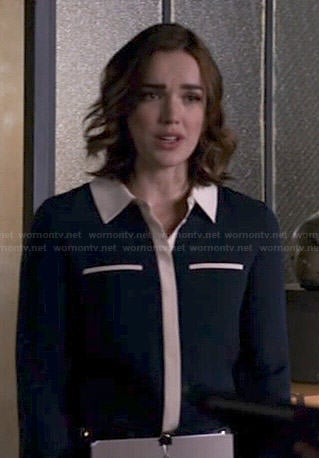 Jemma’s navy blouse with contrasting trim on Agents of SHIELD