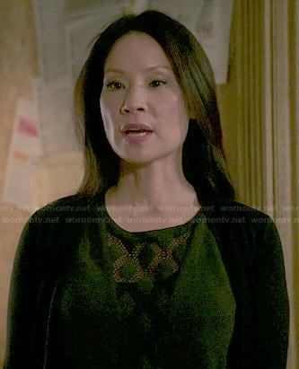 Joan’s black diamond mesh inset top on Elementary