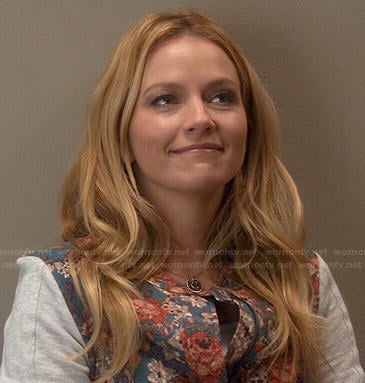 Caryn’s floral jacket with grey sleeves on Weird Loners