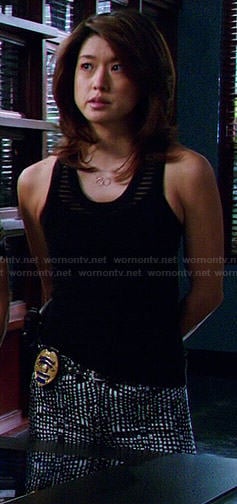 Kono’s black and white printed jeans and striped tank top on Hawaii Five-O