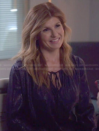 Rayna’s blue metallic keyhole blouse on Nashville