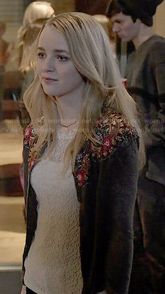 Taylor’s floral embroidered cardigan on Finding Carter