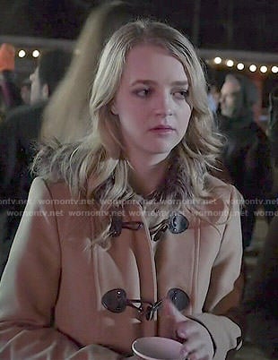 Taylor’s fur-trimmed toggle coat on Finding Carter
