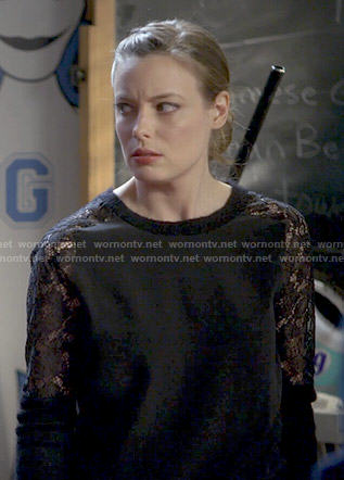 Britta’s black lace sleeve sweater on Community