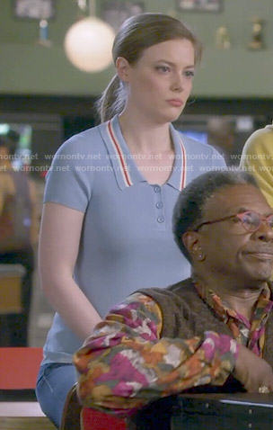 Britta’s blue polo top with striped collar on Community
