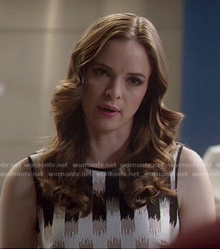 Caitlin’s black, white and brown printed sleeveless top on The Flash