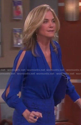 Eve’s blue wrap blouse with split sleeves on Days of our Lives