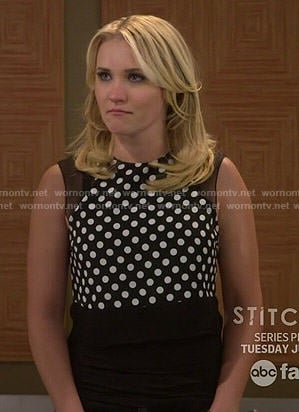 Gabi’s black polka dot top with mesh panels on Young and Hungry