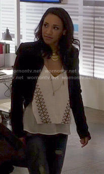 Iris’s white layered top with embroidery on The Flash