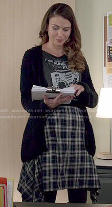 Liza’s punk graphic tee and plaid skirt on Younger