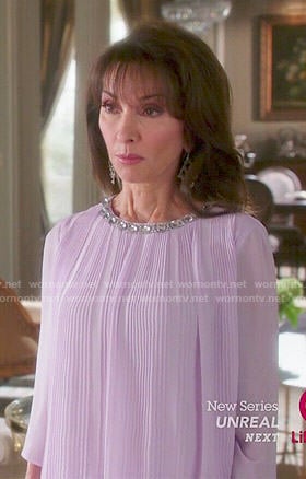 Genevieve’s purple pleated blouse with jewelled neckline on Devious Maids
