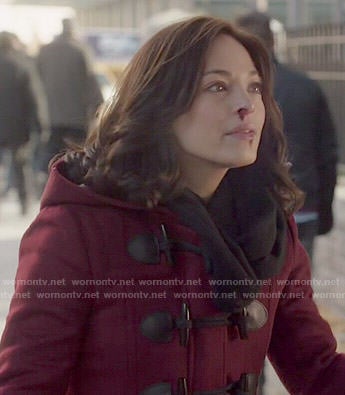 Cat’s red toggle coat on Beauty and the Beast