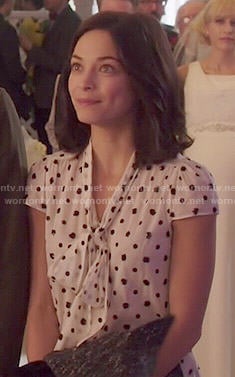 Cat’s white polka dot tie neck blouse on Beauty and the Beast