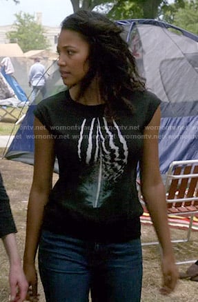 Eva’s feather graphic top on Under the Dome