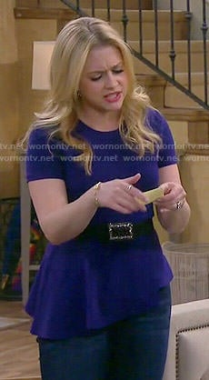 Mel’s blue asymmetric peplum top on Melissa and Joey