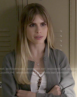 Brooke’s white top with metal rings on Scream