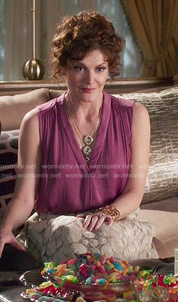 Evelyn’s pink sleeveless top and polka dot lace skirt on Devious Maids