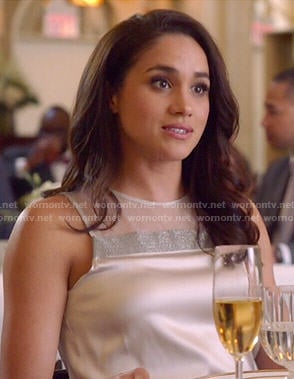 Rachel’s white top with silver strip on Suits