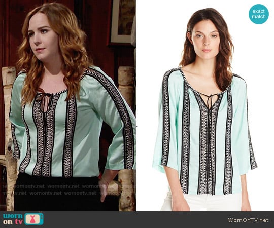 Nanette Lepore Tropical Ribbon Trim Blouse in Aqua worn by Mariah Copeland (Camryn Grimes) on The Young and the Restless