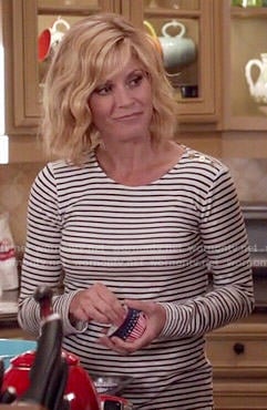 Claire’s striped top with shoulder buttons on Modern Family