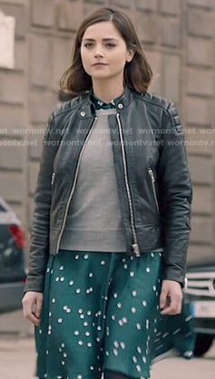 Clara’s green polka dot shirtdress, grey sweater and leather jacket on Doctor Who