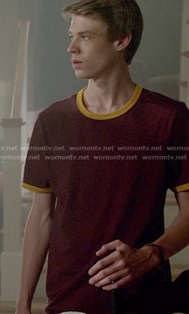 Joe’s burgundy tee with yellow trim on Under the Dome