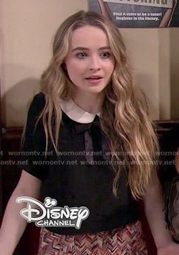 Maya’s black top with white collar and ribbon on Girl Meets World