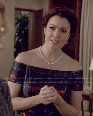 Mellie’s blue and red off-shoulder gown on Scandal