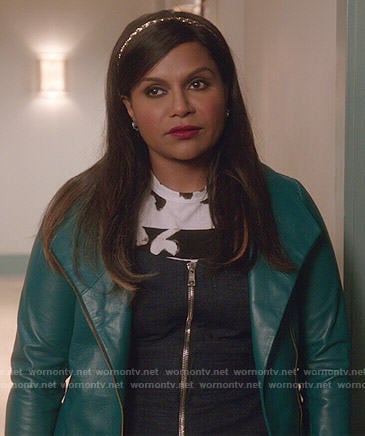 Mindy’s zip front denim jumpsuit, painted print tee and teal leather jacket on The Mindy Project