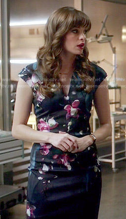 Caitlin’s navy floral v-neck dress on The Flash