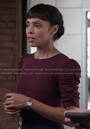 Camille’s burgundy ruched sleeve top on Bones