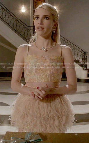 Chanel’s coral feather skirt and crop top on Scream Queens