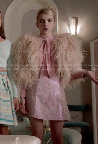 Chanel’s feather bolero, pink blouse and metallic skirt on Scream Queens