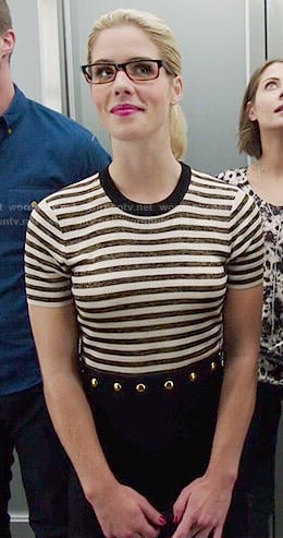 Felicity’s black and white striped dress with gold studs on Arrow