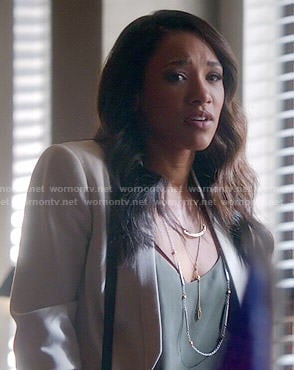 Iris’s white cropped jacket and green cami on The Flash