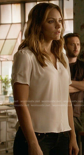 Paige’s white split-neck blouse on Scorpion
