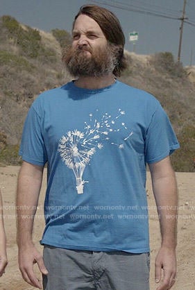 Phil’s blue dandelion print t-shirt on Last Man on Earth